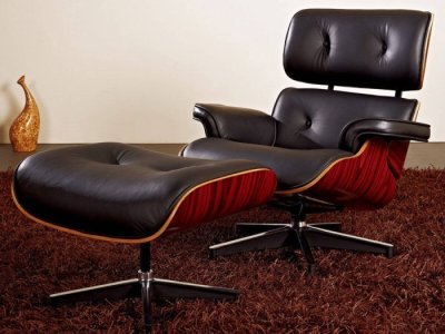 Sillón giratorio Lounge en piel negra y madera